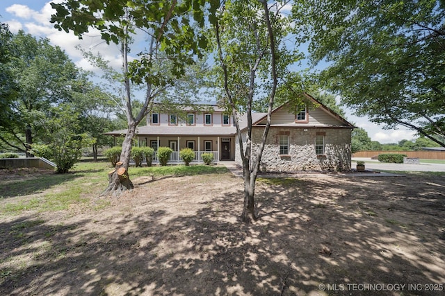 10102 N 147th E Ave, Owasso, OK 74055 - view of front facade with covered porch and stone siding