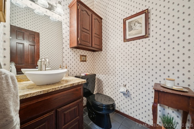 10102 N 147th E Ave, Owasso, OK 74055 - bathroom featuring wallpapered walls, vanity, and tile patterned flooring