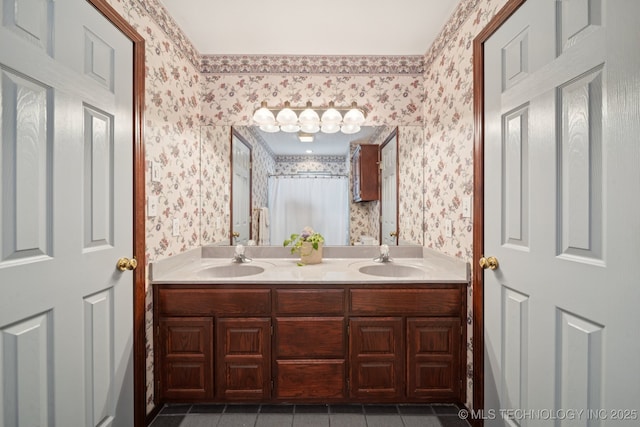 10102 N 147th E Ave, Owasso, OK 74055 - bathroom featuring wallpapered walls, double vanity, and tile patterned floors