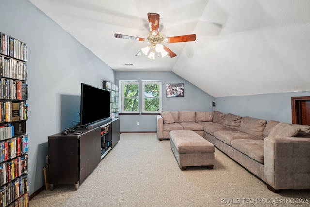 10102 N 147th E Ave, Owasso, OK 74055 - living room featuring carpet floors, lofted ceiling, and ceiling fan