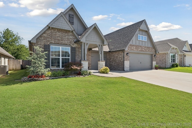 2618 W 115th St S, Jenks, OK 74037 - craftsman house with concrete driveway, board and batten siding, an attached garage, brick siding, and roof with shingles