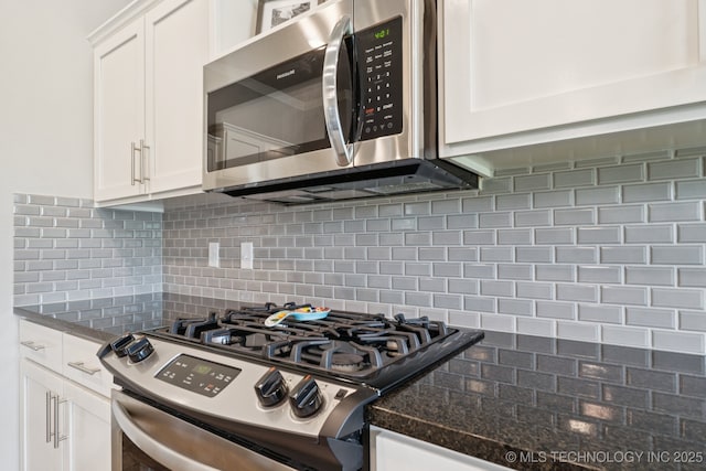 2618 W 115th St S, Jenks, OK 74037 - kitchen featuring appliances with stainless steel finishes, decorative backsplash, and white cabinets