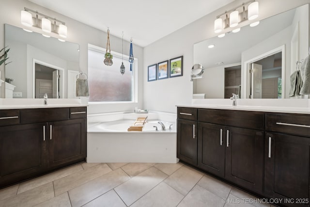2618 W 115th St S, Jenks, OK 74037 - full bath featuring a garden tub, two vanities, and plenty of natural light