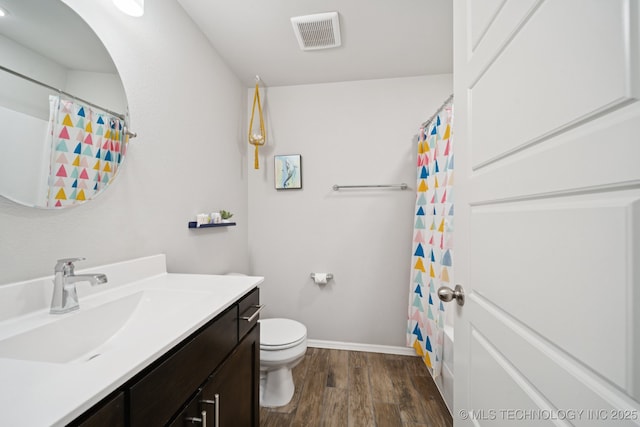 2618 W 115th St S, Jenks, OK 74037 - bathroom featuring vanity and wood finished floors
