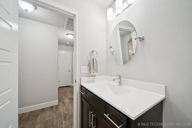 2618 W 115th St S, Jenks, OK 74037 - bathroom with vanity and wood finished floors
