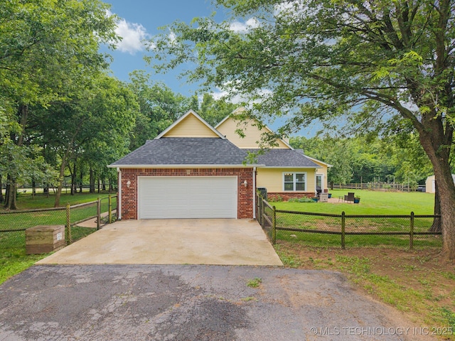 4852 E Redbud Dr, Claremore, OK 74019 - view of front of property featuring driveway, brick siding, and a garage