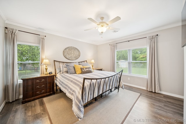 4852 E Redbud Dr, Claremore, OK 74019 - bedroom with ornamental molding, dark wood-type flooring, and ceiling fan