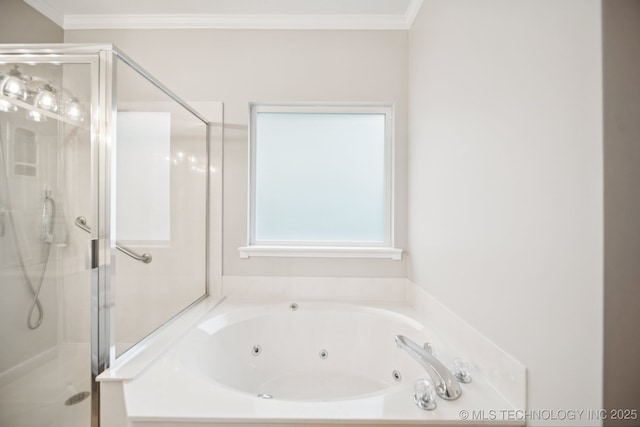 4852 E Redbud Dr, Claremore, OK 74019 - bathroom featuring a shower stall, a tub with jets, and ornamental molding
