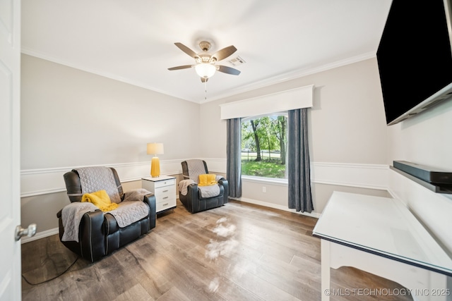 4852 E Redbud Dr, Claremore, OK 74019 - sitting room with a ceiling fan, wood finished floors, and ornamental molding