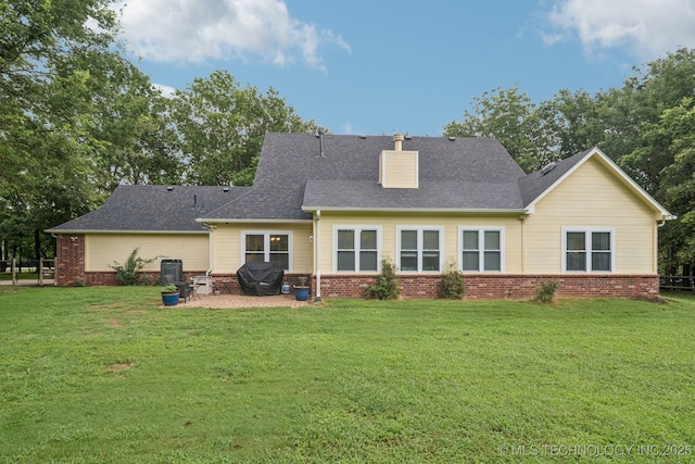 4852 E Redbud Dr, Claremore, OK 74019 - rear view of property featuring a patio area, brick siding, and a yard
