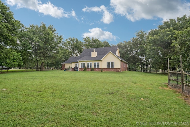 4852 E Redbud Dr, Claremore, OK 74019 - view of front facade with brick siding and view of scattered trees