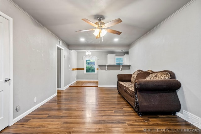 6264 E Latimer St, Tulsa, OK 74115 - living area featuring ceiling fan and dark wood finished floors