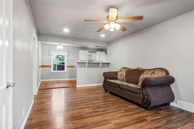 6264 E Latimer St, Tulsa, OK 74115 - living area with wood finished floors, ceiling fan, ornamental molding, and recessed lighting