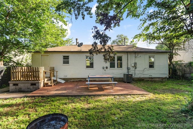 6264 E Latimer St, Tulsa, OK 74115 - back of house with an outdoor fire pit and a patio