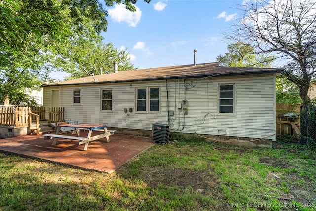 6264 E Latimer St, Tulsa, OK 74115 - back of house featuring a patio and a wooden deck