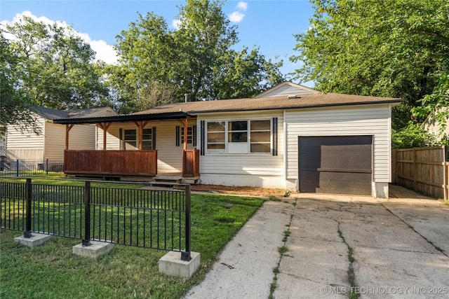 6264 E Latimer St, Tulsa, OK 74115 - single story home featuring an attached garage, a porch, and driveway