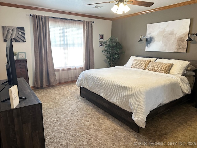 215 Belt St, Eufaula, OK 74432 - bedroom with ornamental molding, carpet flooring, and a ceiling fan