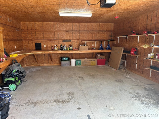 215 Belt St, Eufaula, OK 74432 - garage featuring a garage door opener