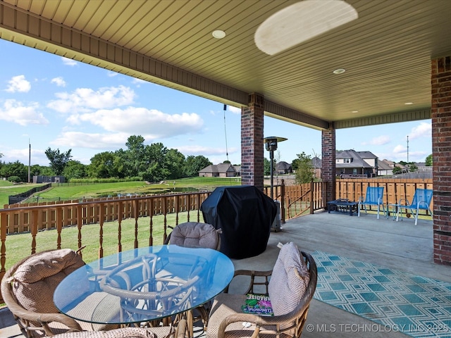 5719 Nottingham Pl, Bartlesville, OK 74006 - deck featuring a grill, a patio area, and outdoor dining space