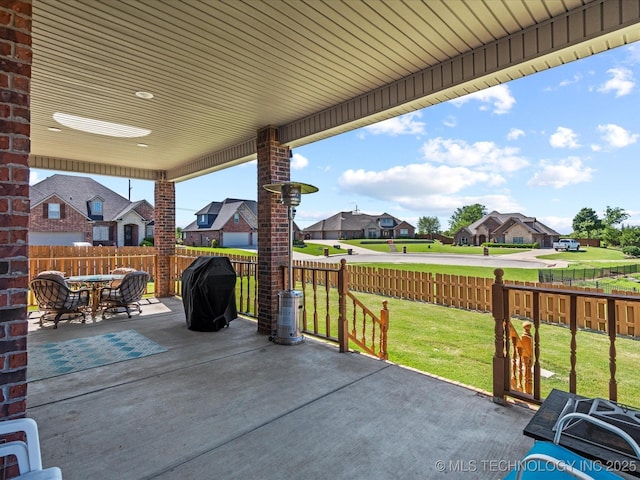 5719 Nottingham Pl, Bartlesville, OK 74006 - view of patio featuring a residential view, area for grilling, and outdoor dining space