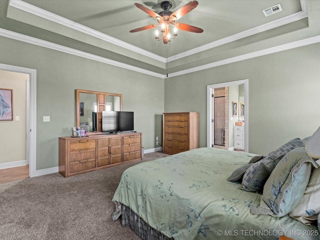 5719 Nottingham Pl, Bartlesville, OK 74006 - bedroom featuring a raised ceiling, ornamental molding, carpet, ceiling fan, and connected bathroom