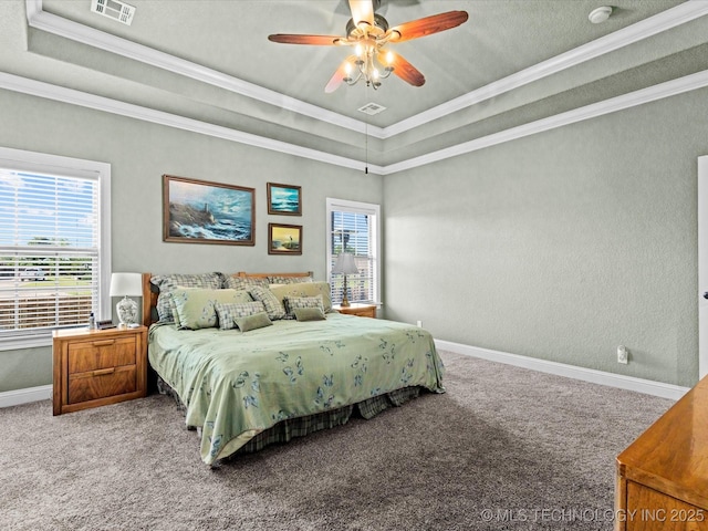 5719 Nottingham Pl, Bartlesville, OK 74006 - bedroom with carpet, a tray ceiling, ornamental molding, and ceiling fan