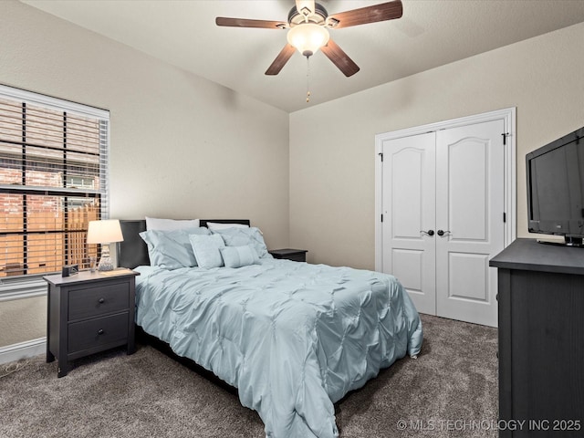 5719 Nottingham Pl, Bartlesville, OK 74006 - carpeted bedroom featuring a closet and ceiling fan