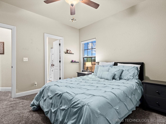5719 Nottingham Pl, Bartlesville, OK 74006 - bedroom featuring dark carpet and a ceiling fan