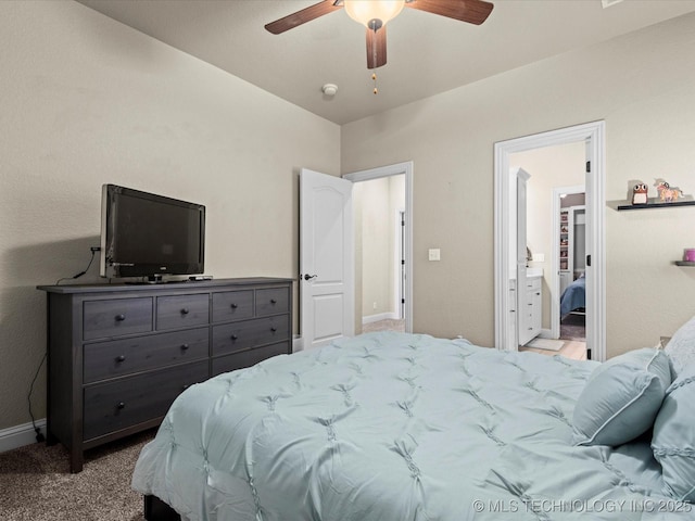 5719 Nottingham Pl, Bartlesville, OK 74006 - carpeted bedroom with a ceiling fan and ensuite bathroom