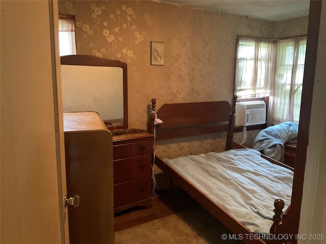 4950 E 41st St N, Tulsa, OK 74115 - bedroom with cooling unit and wallpapered walls