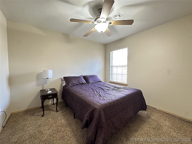 1530 Persimmon, Ardmore, OK 73401 - carpeted bedroom featuring ceiling fan and baseboards