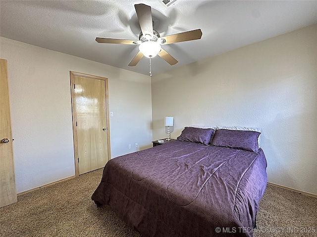1530 Persimmon, Ardmore, OK 73401 - bedroom with carpet and a ceiling fan