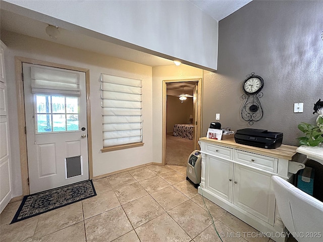 1530 Persimmon, Ardmore, OK 73401 - entrance foyer with light tile patterned floors and ceiling fan
