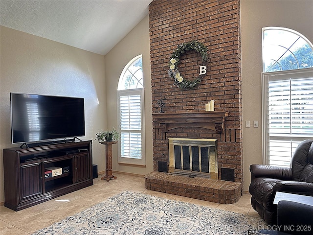 1530 Persimmon, Ardmore, OK 73401 - living room featuring vaulted ceiling, light tile patterned floors, and a fireplace