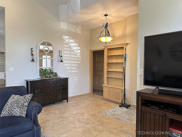 1530 Persimmon, Ardmore, OK 73401 - living room with light tile patterned floors and a towering ceiling