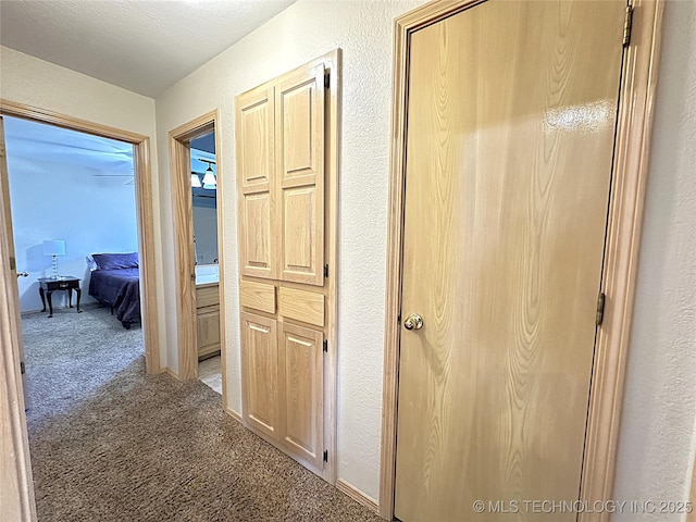 1530 Persimmon, Ardmore, OK 73401 - hall with light carpet and a textured wall