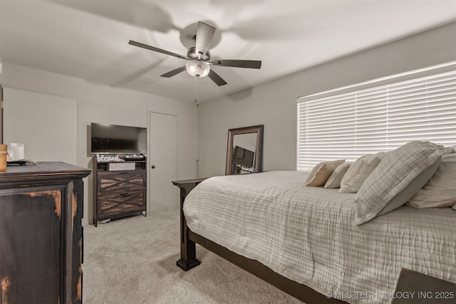 15917 E 131st St Unit 93, Broken Arrow, OK 74011 - bedroom with light carpet and a ceiling fan