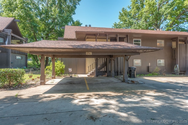 15917 E 131st St Unit 93, Broken Arrow, OK 74011 - view of parking featuring stairway and concrete driveway