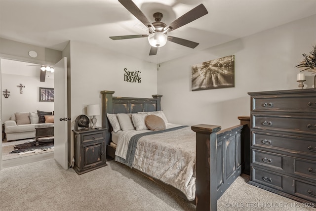 15917 E 131st St Unit 93, Broken Arrow, OK 74011 - bedroom with light carpet and a ceiling fan