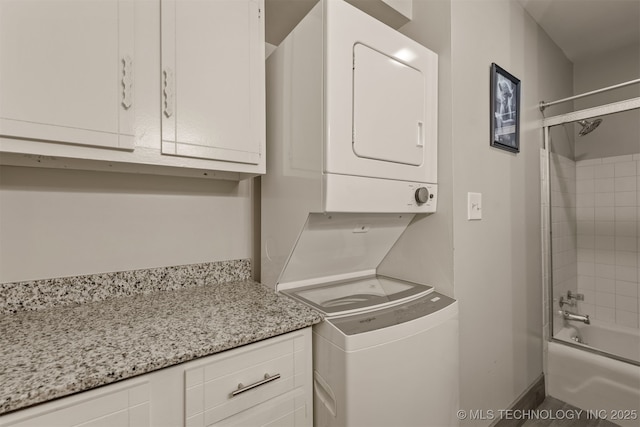 15917 E 131st St Unit 93, Broken Arrow, OK 74011 - laundry room featuring stacked washer and clothes dryer