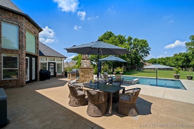 6797 Hummingbird Ct, Owasso, OK 74055 - view of patio featuring outdoor dining area and a pool with connected hot tub