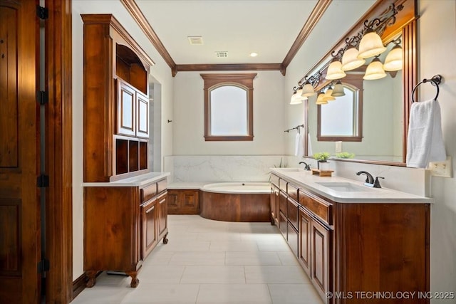 6797 Hummingbird Ct, Owasso, OK 74055 - bathroom with double vanity, a garden tub, and ornamental molding