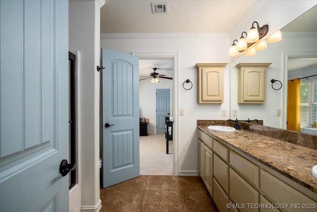 6797 Hummingbird Ct, Owasso, OK 74055 - bathroom featuring double vanity, crown molding, ceiling fan, tile patterned flooring, and a shower