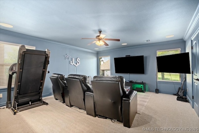 6797 Hummingbird Ct, Owasso, OK 74055 - home theater featuring carpet, a ceiling fan, plenty of natural light, and ornamental molding