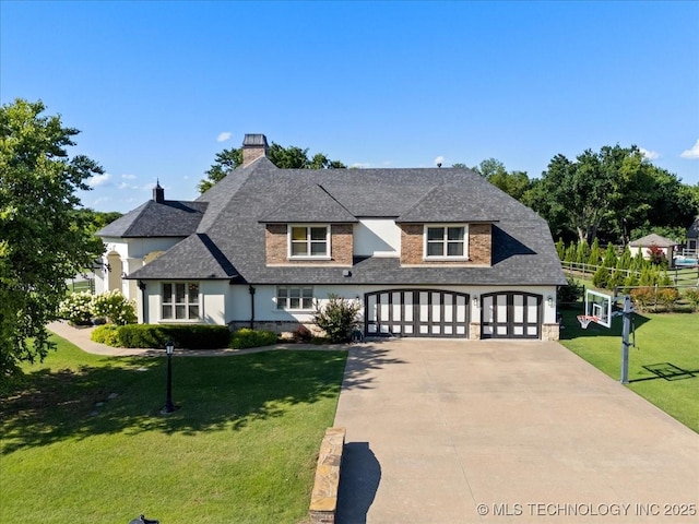 6797 Hummingbird Ct, Owasso, OK 74055 - view of front facade with concrete driveway, roof with shingles, a chimney, and stucco siding
