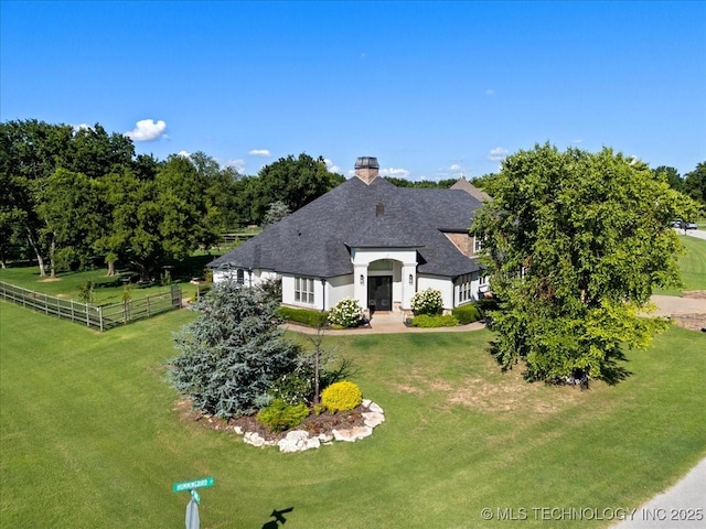 6797 Hummingbird Ct, Owasso, OK 74055 - french country inspired facade featuring a chimney, a shingled roof, and stucco siding