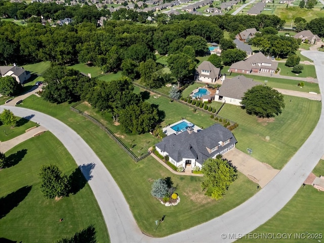 6797 Hummingbird Ct, Owasso, OK 74055 - aerial view of property and surrounding area featuring nearby suburban area