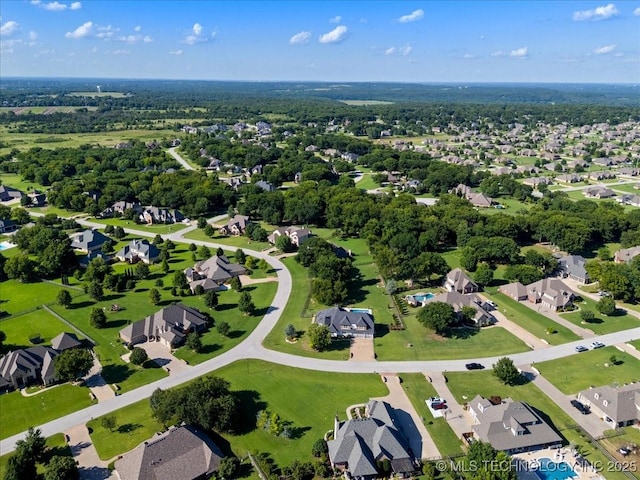 6797 Hummingbird Ct, Owasso, OK 74055 - aerial overview of property's location with nearby suburban area