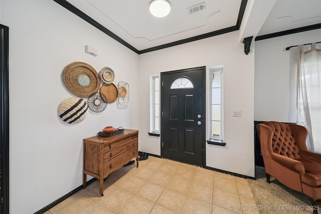 1018 W Evergreen St, Skiatook, OK 74070 - foyer entrance with ornamental molding and light tile patterned floors