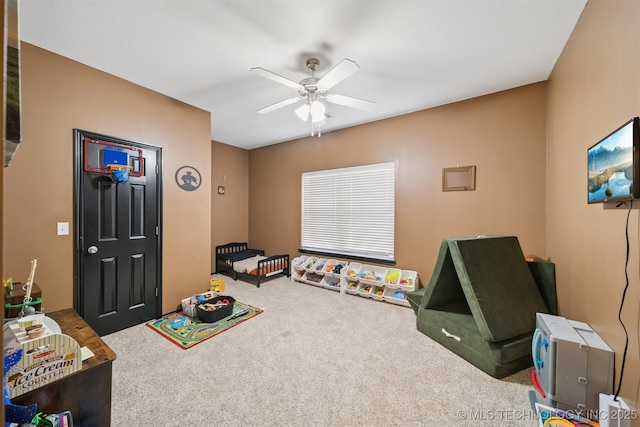 1018 W Evergreen St, Skiatook, OK 74070 - playroom featuring a ceiling fan and carpet flooring